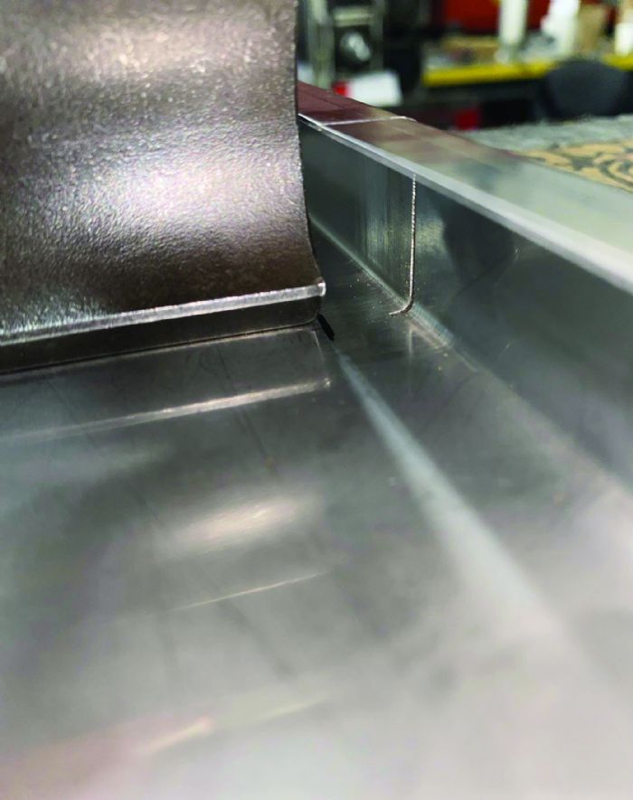 Press Brake Deformation Management: Innovative Solutions to Prevent Feature Distortion - Pictures 8 Fig 4 - Slit the bend line from the material edge to the end of the tool as an alternative to horn punches.