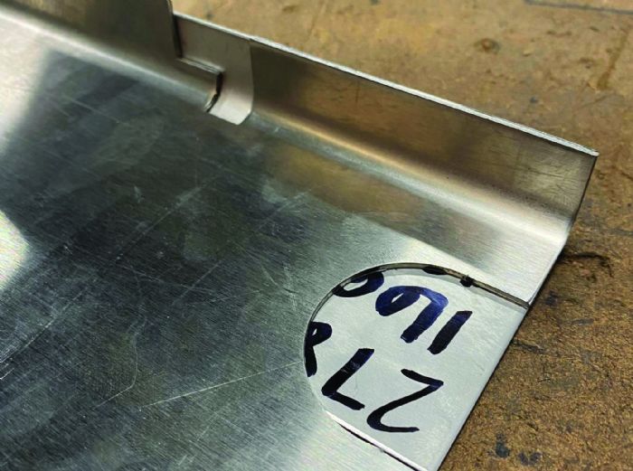 Press Brake Deformation Management: Innovative Solutions to Prevent Feature Distortion - Pictures 10 Fig. 6 - To employ a “sacrificial backer,” place a blank under the workpiece to add support through the bending cycle.