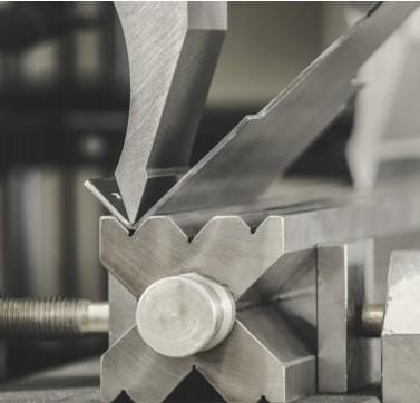 The fundamentals of press brake tooling - Pictures 16 Figure 12 The operator may choose from a variety of die-opening alternatives with this four-way die.