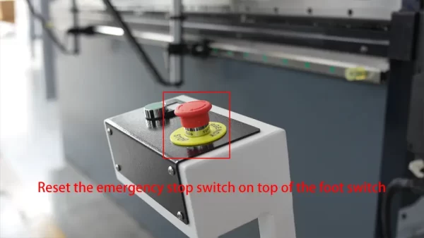 DELEM DA58T CNC Press Brake (finding reference point) – III - Pictures 10 Reset the emergency stop switch on top of the foot switch