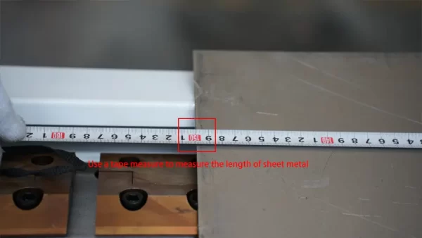 Horizontal V Groover Machine Operation Tutorial - II - Pictures 11 Use a tape measure to measure the length of sheet metal